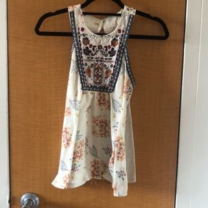 Flowery and embroidered top